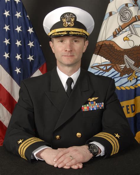 Cmdr.